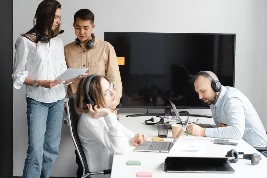 Cold sales agent reviewing call scripts and lead lists